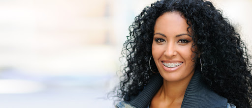 woman wearing braces smiling