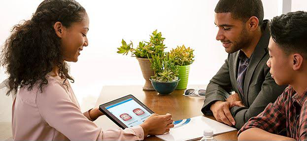 Father and son at a dentist in an invisalign® consultation